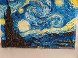 a picture of a picture of a starry night on a refrigerator