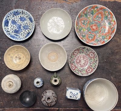 a lot of different bowls and bowls on the table