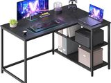 a computer desk with two monitors and a keyboard on it