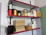 a shelf that has many different items on it
