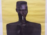 une affiche représentant un homme avec une cigarette à la bouche