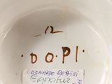 a white bowl with writing on it that says dopp