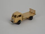 a toy truck that is sitting on a white surface