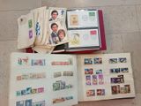 a lot of stamps on a book on the floor