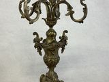 pair of antique brass candelabs with flowers and leaves