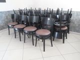 a lot of chairs that are sitting in a room