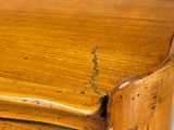 a close up of a piece of wood on a table