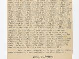 un gros plan d'un morceau de papier sur lequel on a écrit