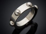 a close up of a ring on a black surface