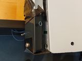 a close up of a piece of metal on a cabinet