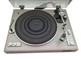 a turntable with a record player on top of it