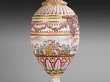an image of a vase with a lid sitting on top of a table