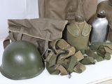 a lot of military items that are on a table