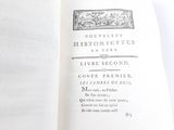 an open book with a black and white picture on it