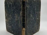an old book opened to show the inside of it