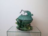 a glass table with a statue of a dog on top of it