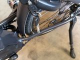 a close up of a bicycle that is parked in a garage