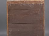 an old wooden box with three drawers sitting on top of a table
