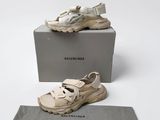 the shoes are on the box and ready to be put into the bag