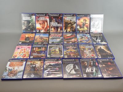 a lot of video games sitting on a table