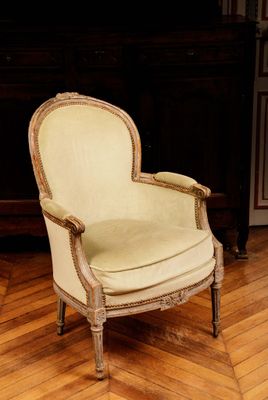 a chair that is sitting on a hard wood floor