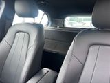 two seats in the back of a car that are empty
