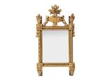 une image d'un miroir avec un cadre doré sur un fond blanc