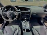 a dashboard of a car with a view of a field