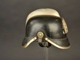 a helmet that is sitting on a stand on a table