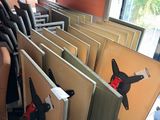 a lot of chairs that are sitting in a room