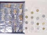 a lot of coins in a bag on the table