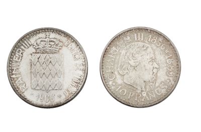 une pièce d'argent surmontée d'une couronne