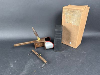 a pair of scissors and a box on a table
