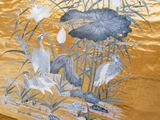 a picture of a painting of birds and flowers on a gold background