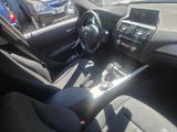 a picture of a car interior with a steering wheel