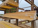 a lot of wooden planks stacked on top of each other