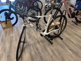 many bikes that are sitting on the floor in the store