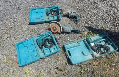 many tools that are laying out on the ground