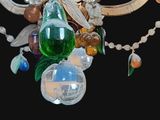 a chandelier with a bunch of glass beads hanging from it