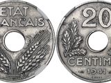 an old french 20 cent coin with the number twenty on it