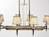 a chandelier that has five lamps on each of it