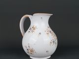 une image représentant un vase blanc orné de fleurs