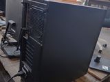 two computer monitors sitting on a pallet in a warehouse
