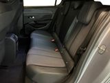 the back seats of a car with a seat belt in the back of it