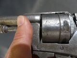 a person holding a gun in their hand
