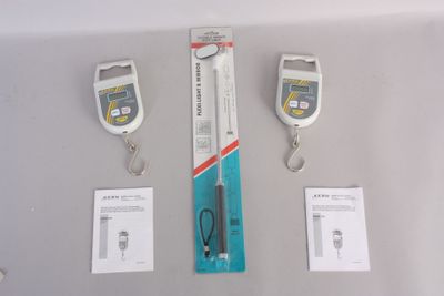 three different types of electronic measurings on the table