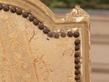 a close up of a chair that has been painted white