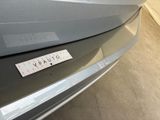 a picture of a car with a sticker on it ' s bumper