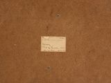 a piece of cardboard with a piece of paper on top of it