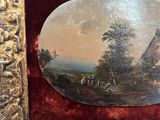 a picture of a painting in a frame on the wall